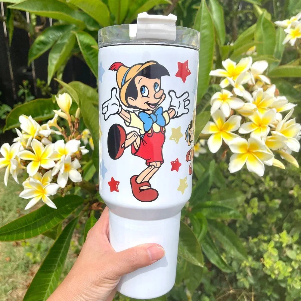 Disney Pinocchio 40 oz Tumbler/Water bottle/Mug with hand carry handle. Large c